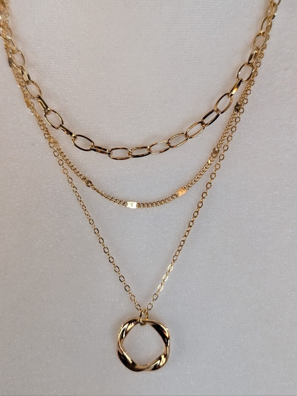 Layered Gold Tone Necklace With Charm